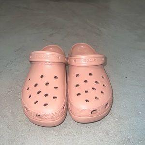 Pink platformed crocs size 10 W. Never worn before
